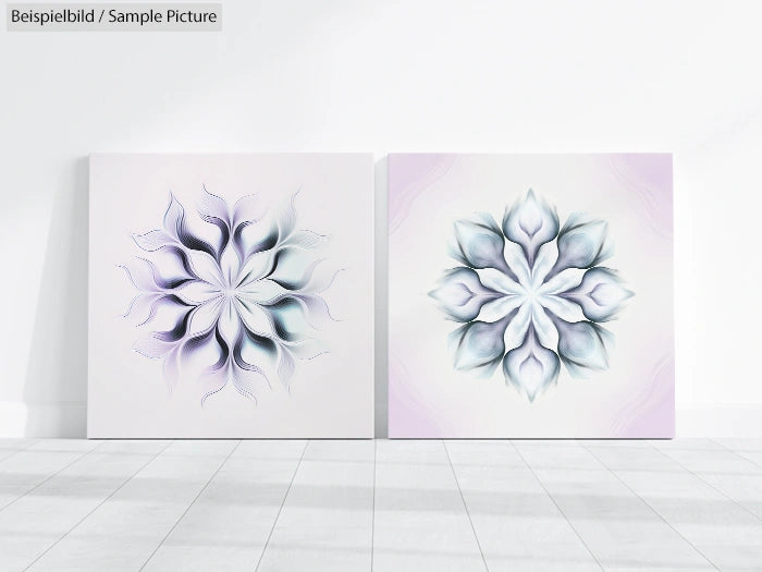 Two abstract floral artworks with petal-like designs in pastel colors on a white tiled floor.