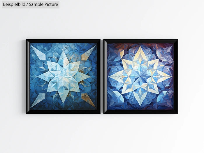 Two framed abstract geometric star artworks with blue tones on a white wall.