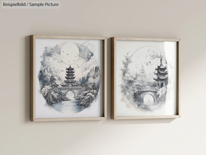 Two framed watercolor paintings of tranquil Asian landscapes with pagodas and trees, in a minimalistic setting.