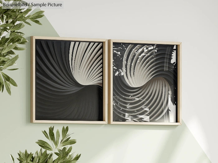 Two framed abstract artworks with spiral patterns on a wall, surrounded by green plant leaves.