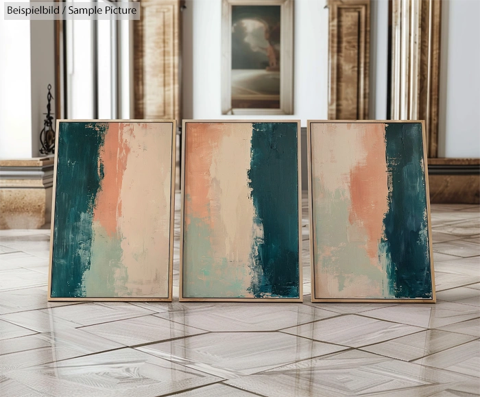 Three abstract paintings with vertical teal and peach brush strokes, displayed on a reflective parquet floor.