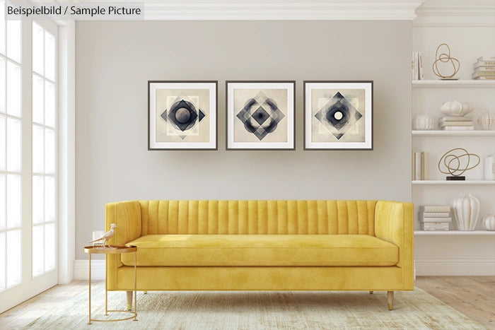 Modern living room with yellow sofa, geometric art on grey wall, and decorative shelves.