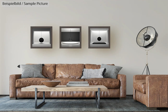 Modern living room with brown leather sofa, wooden coffee table, and three framed artworks on the wall.