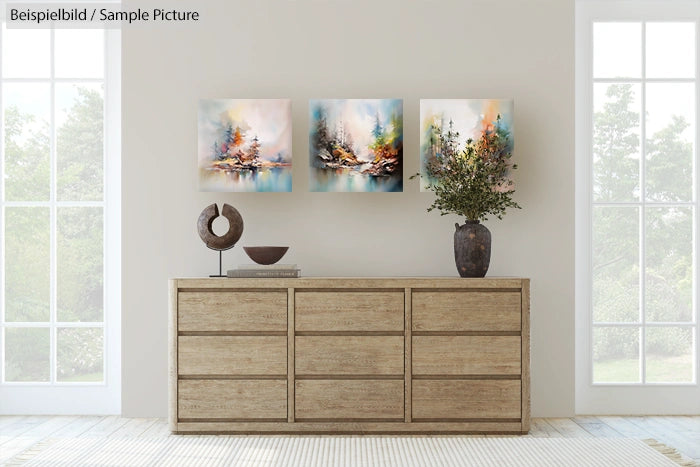 Minimalist living room with a wooden sideboard, abstract paintings, and decorative vases, flanked by large windows.