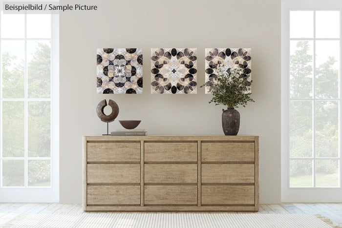 Modern living room with wooden dresser, decorative artwork, vase, and sculpture. Large windows on each side.