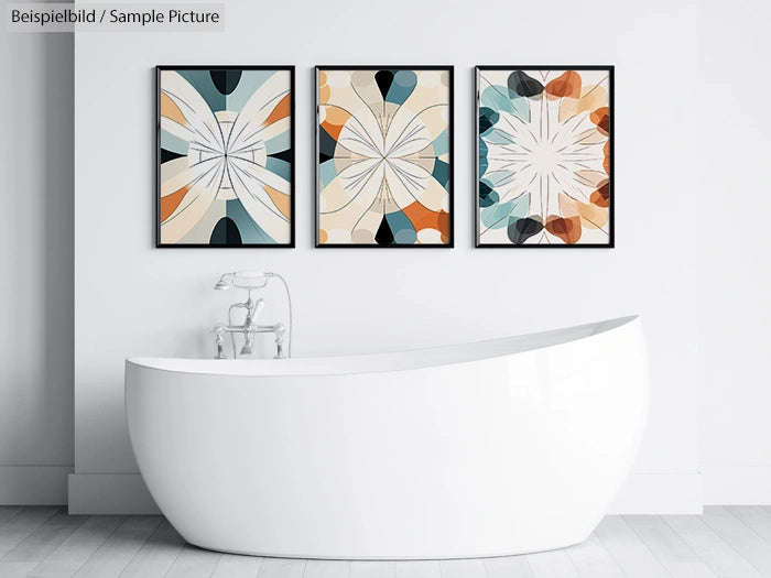 Modern bathroom with white tub and three abstract geometric paintings on the wall.