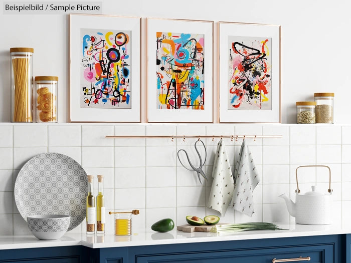 Modern kitchen with abstract paintings, utensils, and jars on shelves. Blue counter with fruits and teapot.