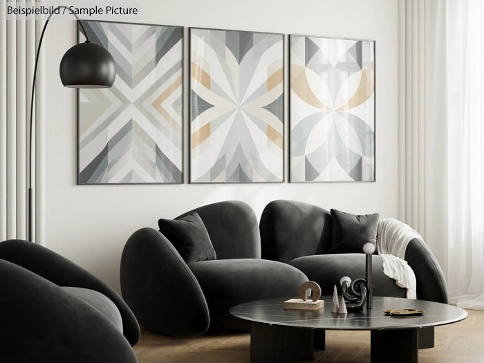 Modern living room with black rounded furniture and abstract geometric wall art in neutral tones.