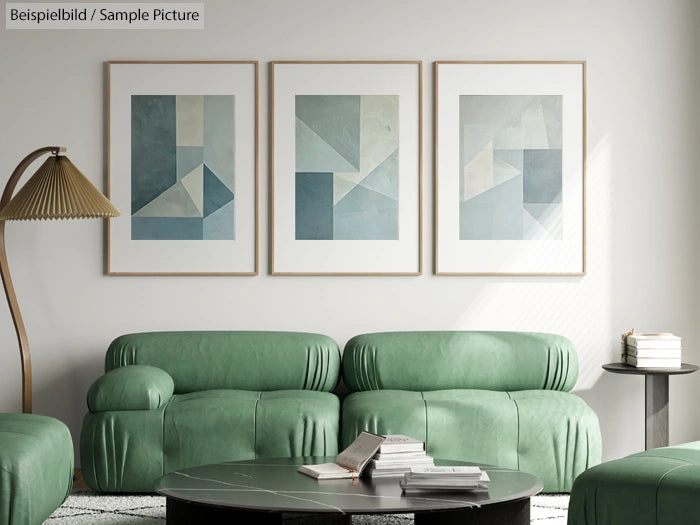 Modern living room with green sofas, geometric artwork, and a sleek lamp.