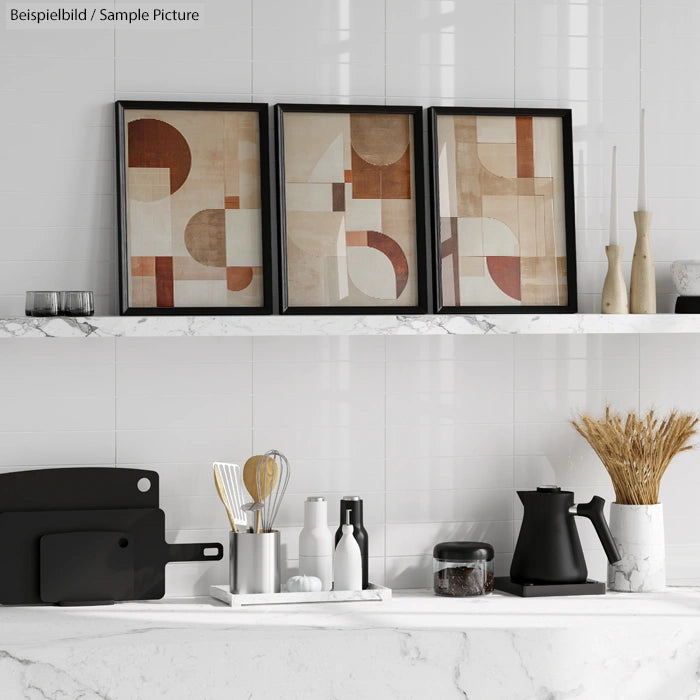 Modern kitchen shelf with abstract art, black kettle, cooking utensils, and decor on white marble countertop.