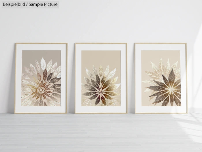 Minimalist room with three framed botanical art prints featuring leaf patterns in neutral tones.