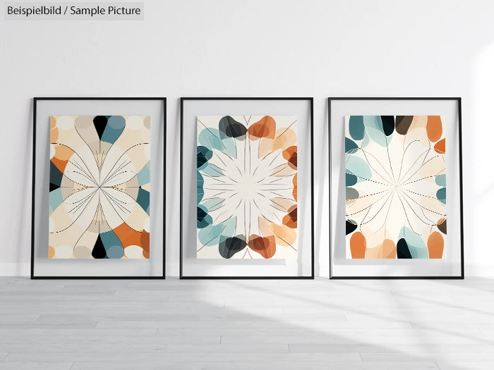 Three framed abstract art pieces with geometric shapes in orange, blue, and beige hues on a minimalist wall.