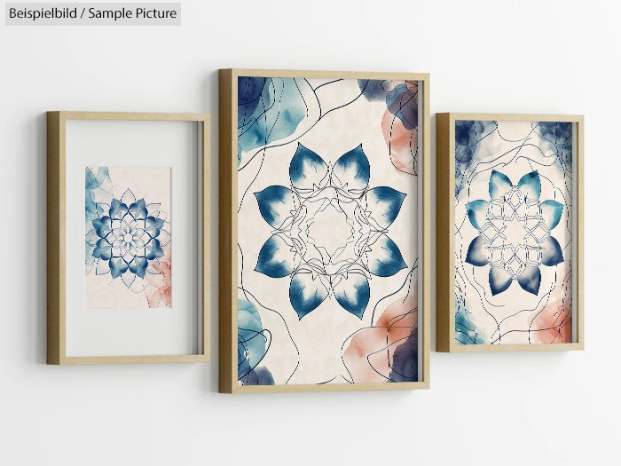 Set of three framed floral prints with blue and pastel tones on a white wall.