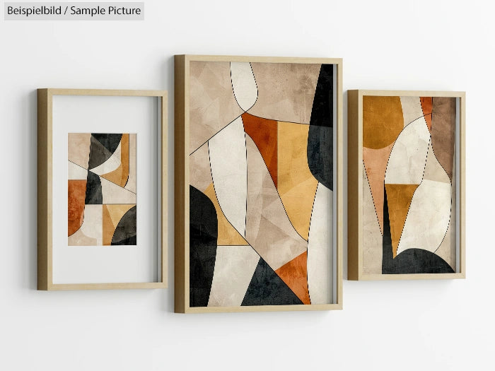 Abstract geometric paintings with earth tones in matching wooden frames on a white wall.