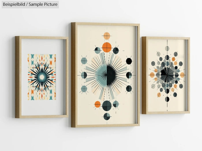 Trio of framed geometric art prints with circular and starburst patterns in orange, gray, and black on a white wall.