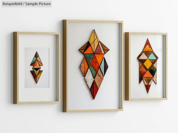 Set of three geometric wood art pieces in framed display, featuring triangular patterns in various colors.