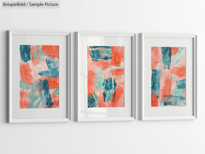 Three framed abstract paintings with blue and orange brushstrokes on a white wall.