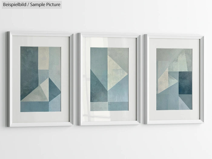 Set of three minimalist geometric artworks in blue tones framed on a white wall.