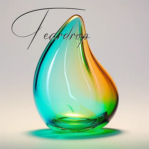 Multicolored glass teardrop sculpture with word 'Teardrop' in elegant font.